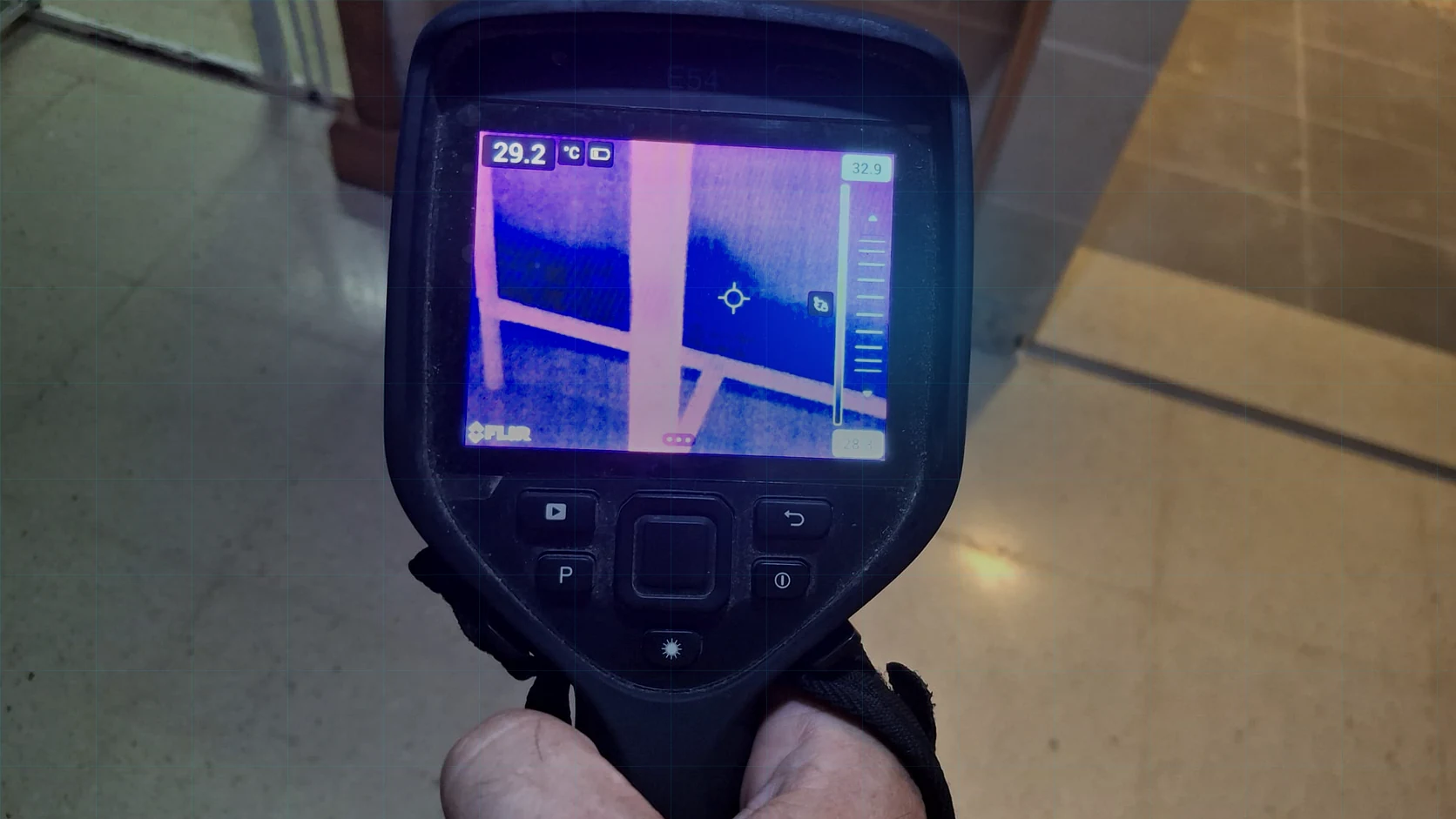 Real FLIR thermal camera inspection photo showing a thermal screen during a site check